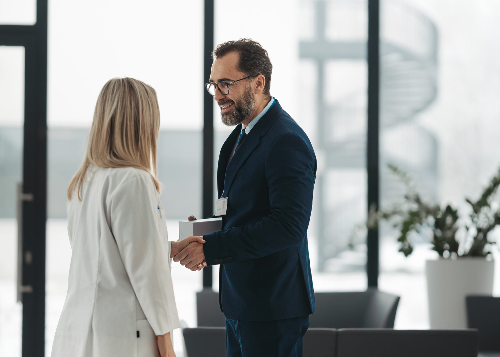 two executives shaking hands